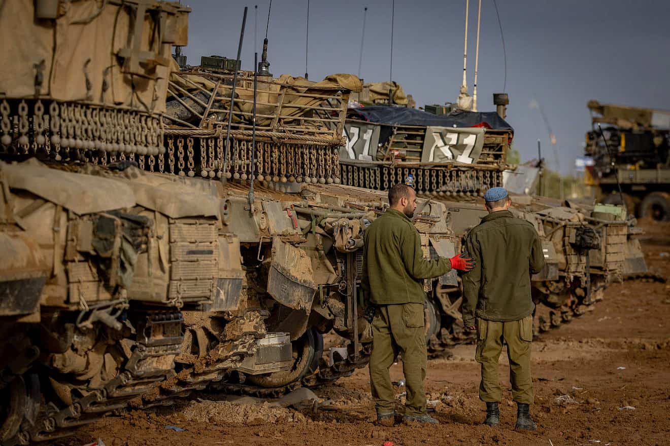 Israeli soldiers during the temporarily truce near the Israeli-Gaza border in southern Israel on Nov. 27, 2023. Photo by Yonatan Sindel/Flash90.
