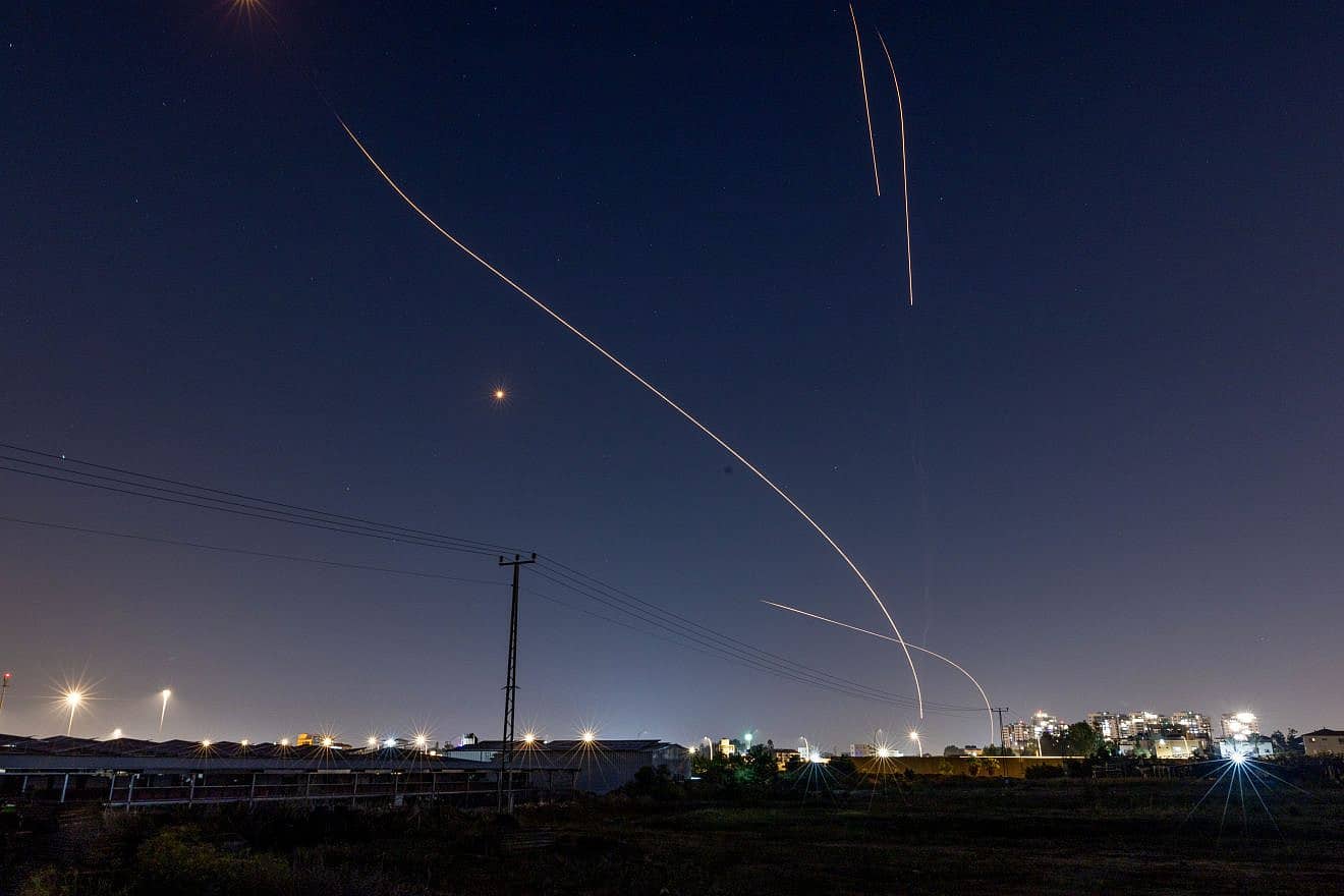 An Iron Dome air-defense battery fires interception missiles at rockets fired from the Gaza Strip towards central Israel, as it seen from Moshav Yashresh, on Nov. 7, 2023. Photo by Yossi Aloni/Flash90.