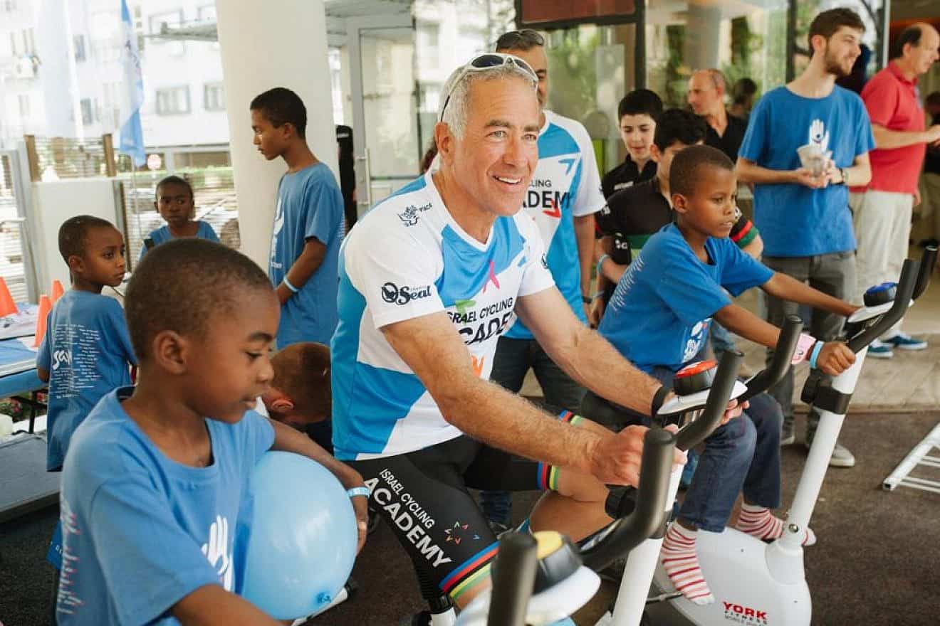 Sylvan Adams with children brought to Israel for emergency medical treatment with Save A Child’s Heart at ​the Sylvan Adams Emergency Hospital wing at Tel Aviv Sourasky Medical Center (Ichilov). Credit: Courtesy of SACH.