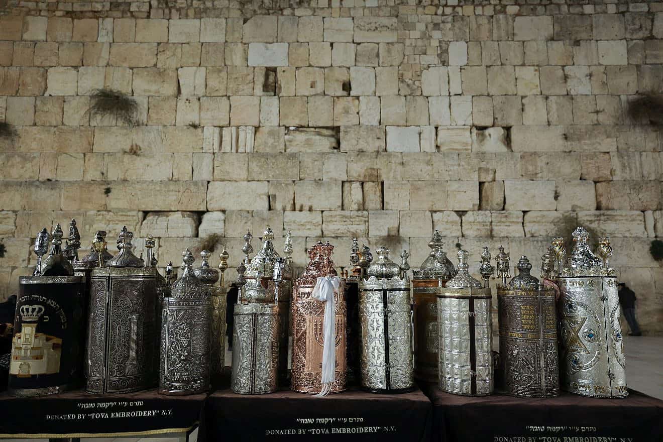 Two new Torah scrolls have been dedicated to the memory of Israeli civilians and soldiers killed in the Oct. 7 Hamas terrorist attacks and ongoing war, in addition to  the hostages being held in Gaza, at the Western Wall in Jerusalem's Old City, Nov. 21, 2023. Photo by Yonatan Sindel/Flash90.