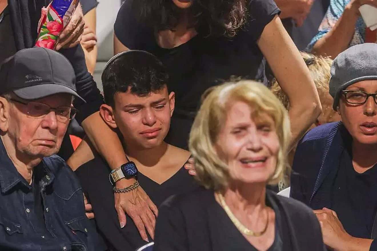 Yaniv Zohar at the funeral for his parents and sisters, Oct. 17, 2023. Photo by Yehoshua Yosef.