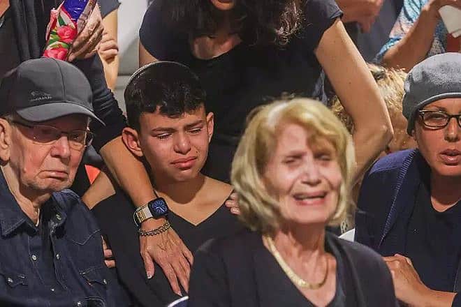 Yaniv Zohar at the funeral for his parents and sisters, Oct. 17, 2023. Photo by Yehoshua Yosef.