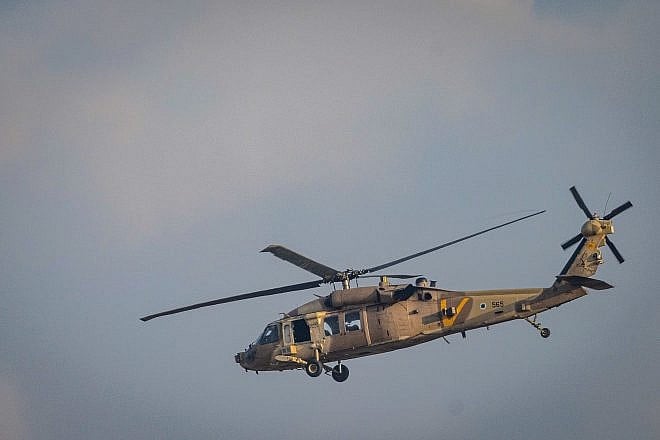 A IAF helicopter flies near the border with the Gaza Strip, Nov. 1, 2023. Photo by Chaim Goldberg/Flash90.