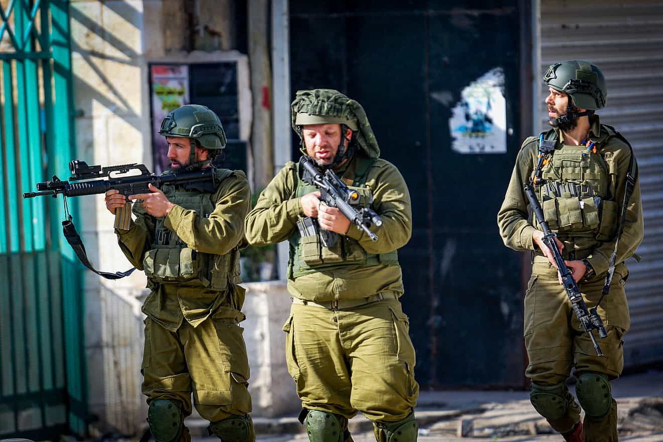 Israeli soldiers seen during a military raid, in the Samaria city of Jenin, Dec. 12, 2023. Photo by Nasser Ishtayeh/Flash90.