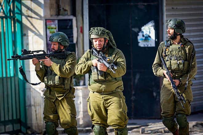 Israeli soldiers seen during a military raid, in the Samaria city of Jenin, Dec. 12, 2023. Photo by Nasser Ishtayeh/Flash90.