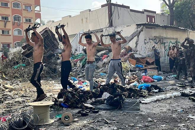 Terrorists surrender to Israeli forces near Kamal Adwan Hospital in northern Gaza, Dec. 14, 2023. Credit: IDF.