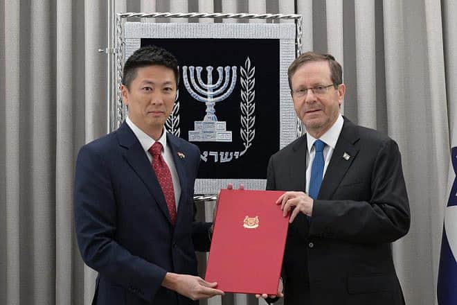Singapore's Ambassador to Israel Ian Mak Jung-I presents his credentials to Israeli President Isaac Herzog in Jerusalem on Dec. 19, 2023. Photo by Avi Kener/GPO.