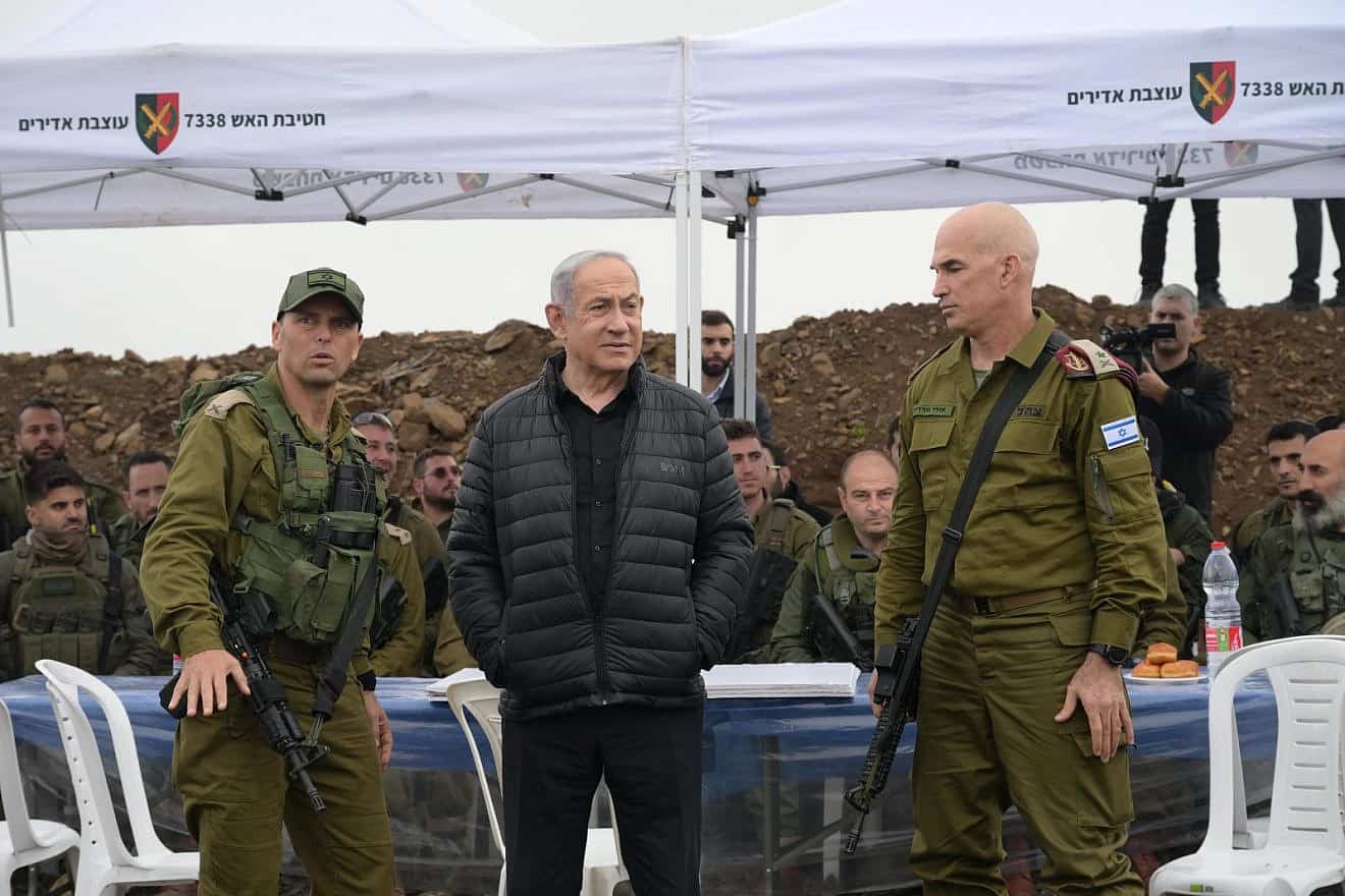 Prime Minister Benjamin Netanyahu holds a situational assessment near Israel's northern border with Lebanon, Dec. 7, 2023. Credit: Amos Ben-Gershom/GPO.