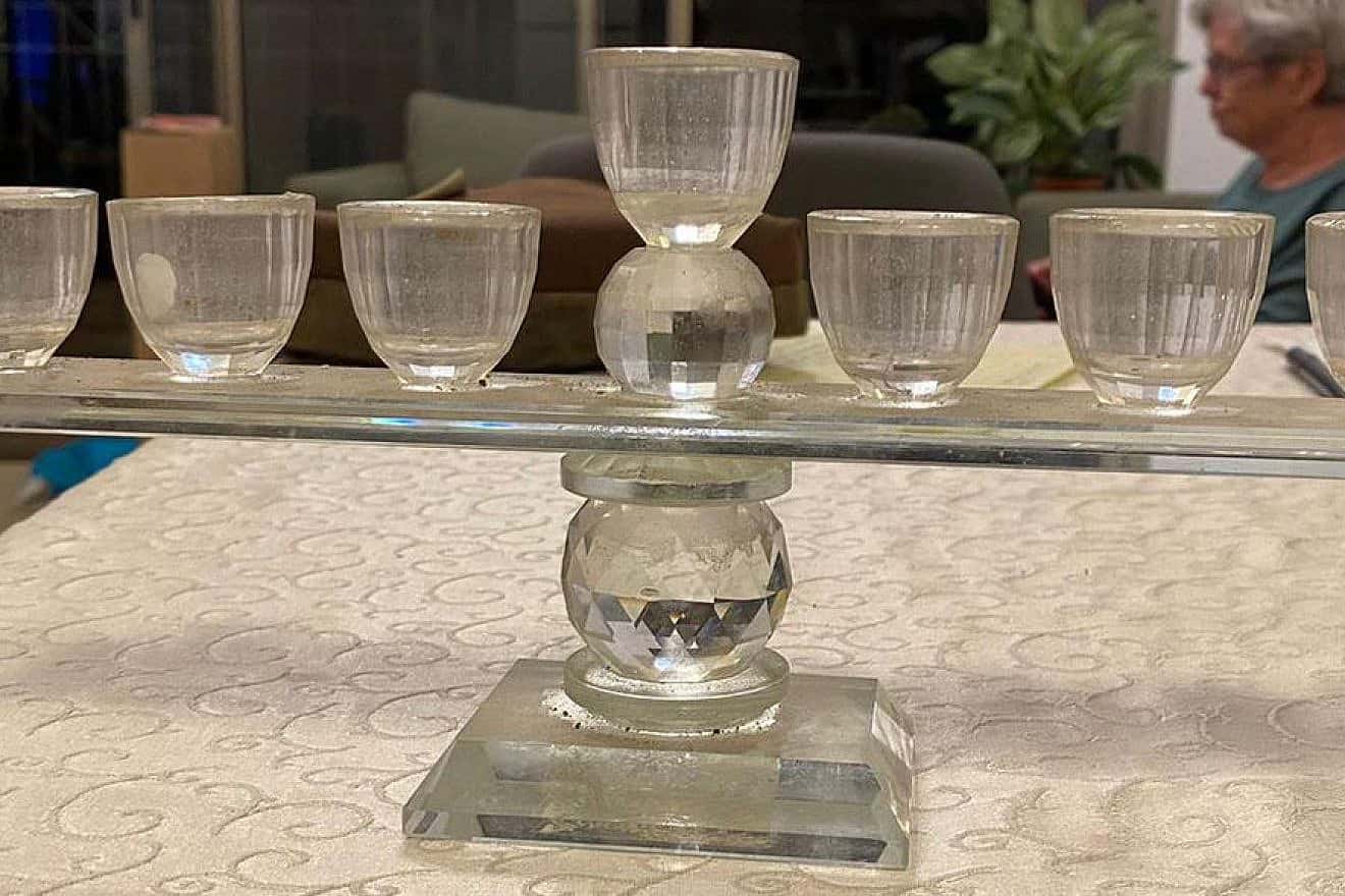 Shai Hermesh's menorah survived the destruction of Kibbutz Kfar Aza. Credit: Courtesy.