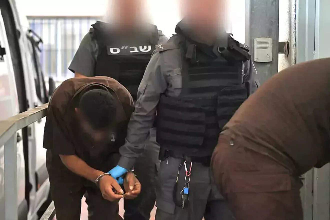Israel Prison Service guards transport Hamas terrorists who perpetrated atrocities on Oct. 7. Credit: Israel Prison Service.