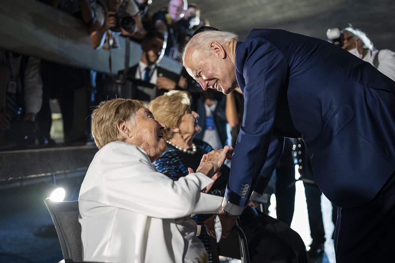 U.S. President Joe Biden speaks with Holocaust survivors Gita Cycowicz and Rena Quint after a wreath-laying ceremony at Yad Vashem in Jerusalem on July 13, 2022. Credit: Adam Schultz/White House.