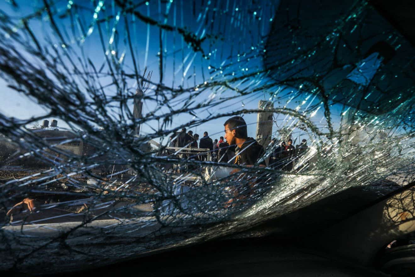 Palestinians at the site of a destroyed building from an Israeli airstrike in Rafah, in the southern Gaza Strip, on Jan. 7, 2024. Photo by Abed Rahim Khatib/Flash90.