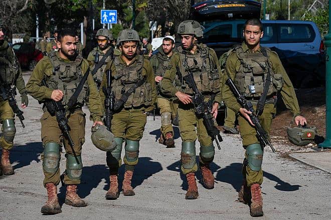 A community emergency squad trains with IDF soldiers, simulating a terrorist infiltration scenario, in northern Israel, Jan. 18, 2024. Photo by Michael Giladi/Flash90.