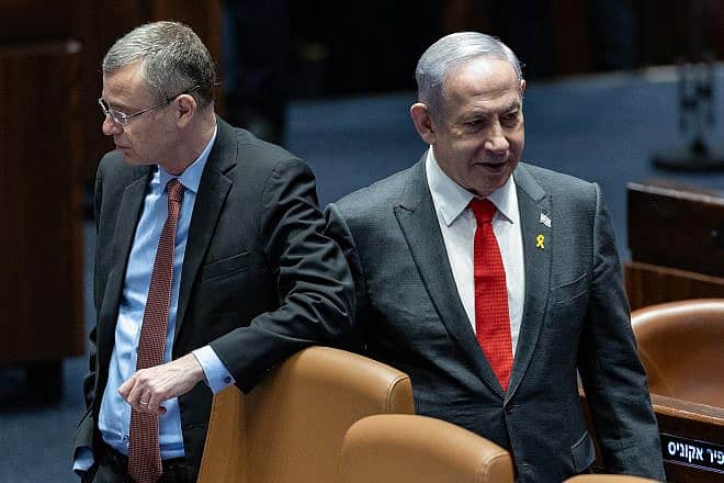 Israeli Prime Minister Benjamin Netanyahu and Justice Minister Yariv Levin in the assembly hall of the Knesset in Jerusalem, Jan. 24, 2024. Photo by Yonatan Sindel/Flash90.