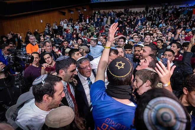 Ministers and MK's dance during the 'victory conference' at the International Convention Center in Jerusalem on Jan. 28, 2024. Photo by Chaim Goldberg/Flash90.