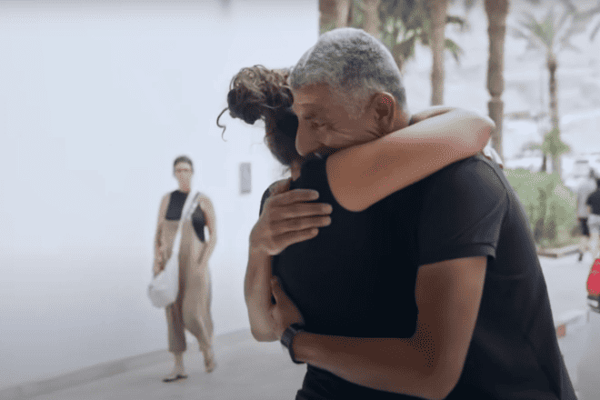 Kibbutz Be’eri resident Aya Meydan hugs one of the Bedouin rescuers who saved her from Hamas terrorists on Oct. 7, 2023. Source: Screenshot/Partners in Fate.