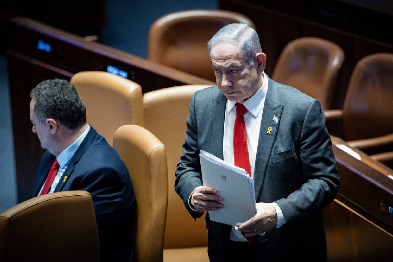 Prime Minister Benjamin Netanyahu approaches the podium during a plenum session for the Knesset's 75th birthday, Jan. 24, 2024. Photo by Yonatan Sindel/Flash90.