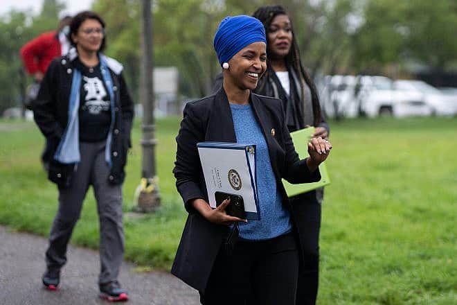 Rep. Ilhan Omar (D-Minn.), Rep. Ayanna Pressley (D-Mass.), Rashida Tlaib (D-Mich.) and Cori Bush (D-Mo.) speak at the Mississippi River in Minneapolis, asking for U.S. President Joe Biden to stop Line 3 pipeline construction, Sept. 3, 2021. Credit: Chad Davis via Wikimedia Commons.