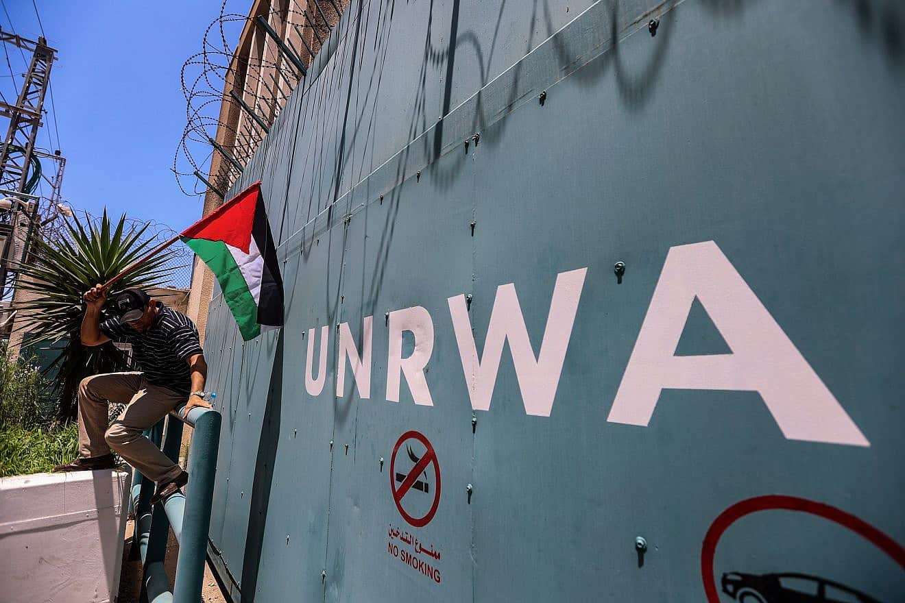 A Palestinian man outside an UNRWA office in Gaza City protests cuts to aid, June 20, 2023. Photo by Anas-Mohammed/Shutterstock.