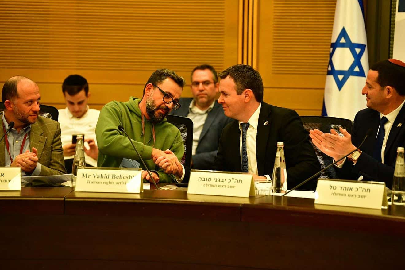 Iranian dissident Vahid Beheshti (left) and Israeli lawmaker Evgeny Sova, co-chairman of the Knesset Israel Victory Caucus, at the parliament in Jerusalem, Jan. 2, 2024. Photo by Michael Katz.