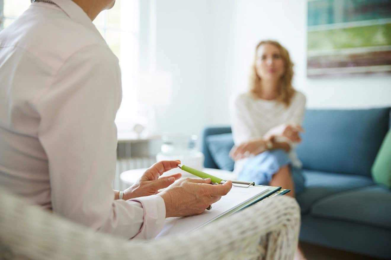 Therapy session stock photo. Credit: Daniel Suhre/Shutterstock.
