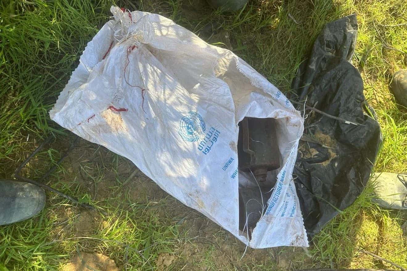 Israeli soldiers found these explosive charges hidden in UNRWA sacks inside a subterranean Palestinian Islamic Jihad weapons factory in Khan Yunis. Credit: IDF Spokesperson.