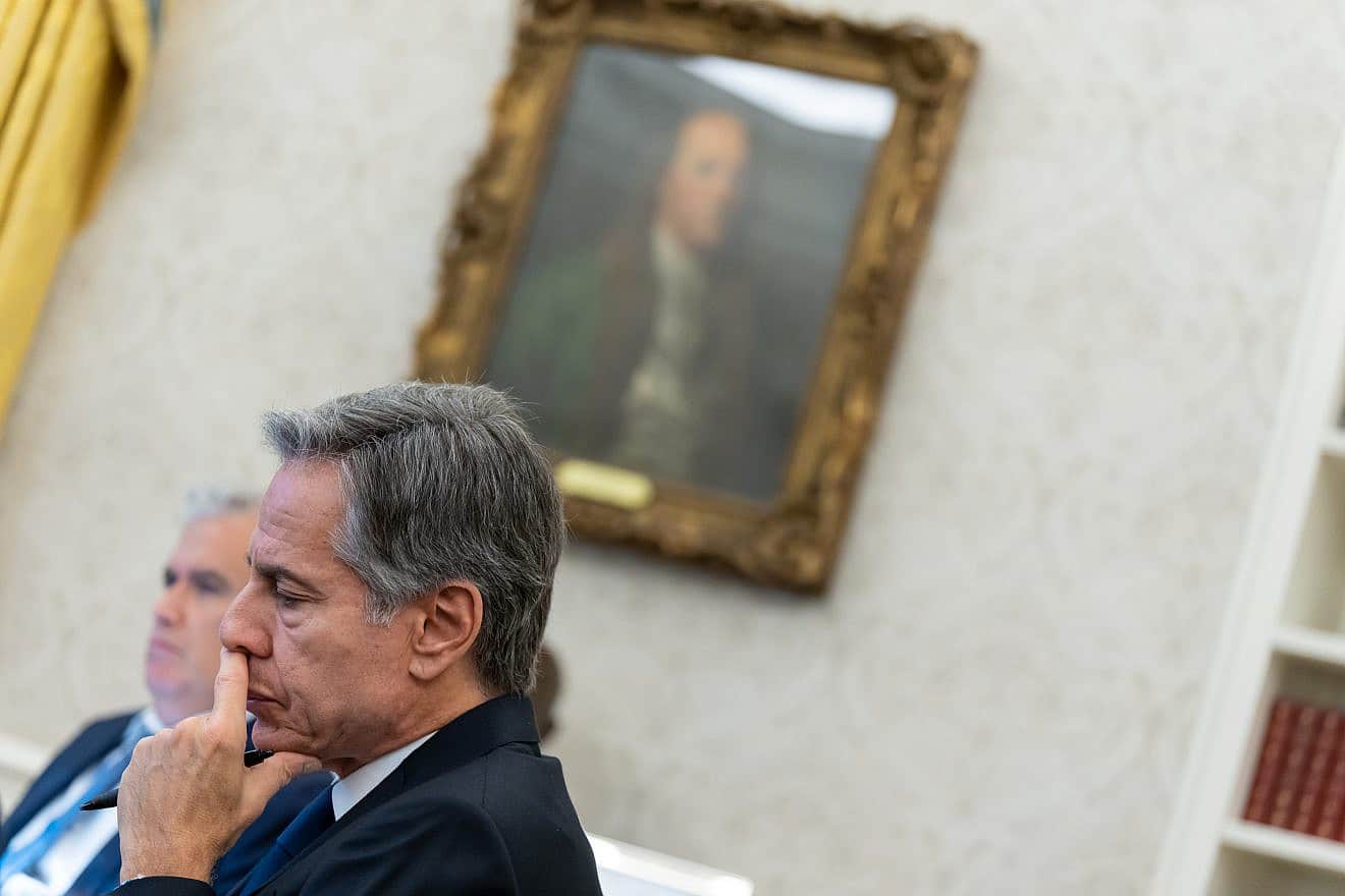 U.S. Secretary of State Antony Blinken on a phone call with U.S. officials, including the president, about Israeli Prime Minister Benjamin Netanyahu’s strategy against Hamas on Oct. 11, 2023, in the Oval Office. Credit: Adam Schultz/White House.
