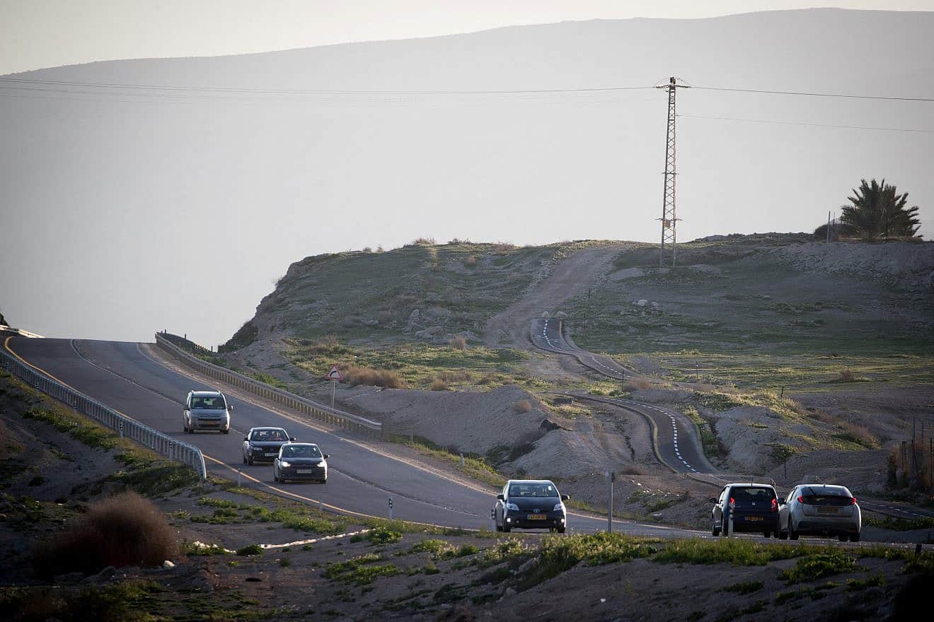 Cars drive on Route 90 in the Jordan Valley, Feb. 13, 2019. Photo by Yonatan Sindel/Flash90.