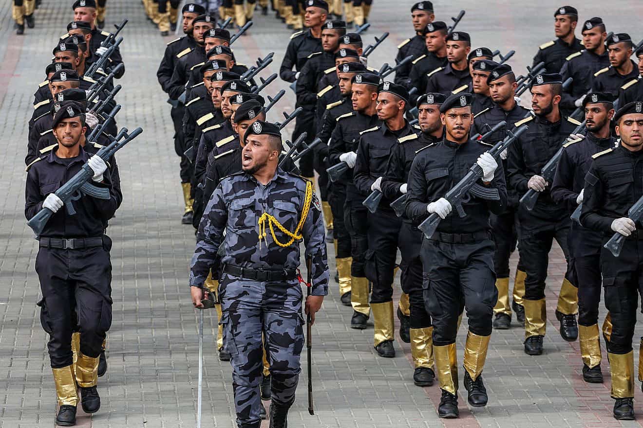 Hamas "security" personnel display their military skills during a police academy graduation ceremony in Gaza City, Feb. 27, 2023. Photo by Atia Mohammed/Flash90.