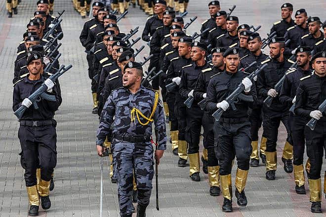 Hamas "security" personnel display their military skills during a police academy graduation ceremony in Gaza City, Feb. 27, 2023. Photo by Atia Mohammed/Flash90.