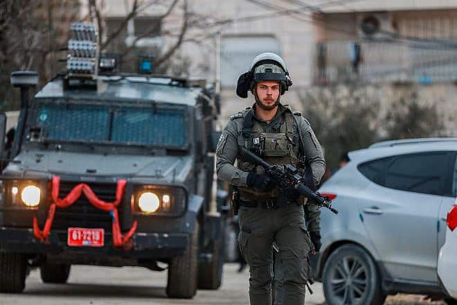 Israeli security forces demolish the house of a Palestinian terrorist who carried out a shooting attack in Kiryat Arba in Judea, Feb. 16, 2023. Photo by Wisam Hashlamoun/Flash90.