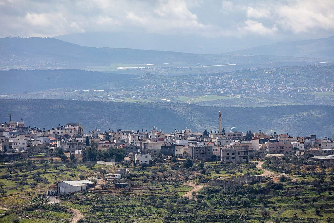 The Judea and Samaria security barrier as seen from Kibbutz Meirav, with Jalbun and Jenin in the background. Photo by Doron Horowitz/Flash90.