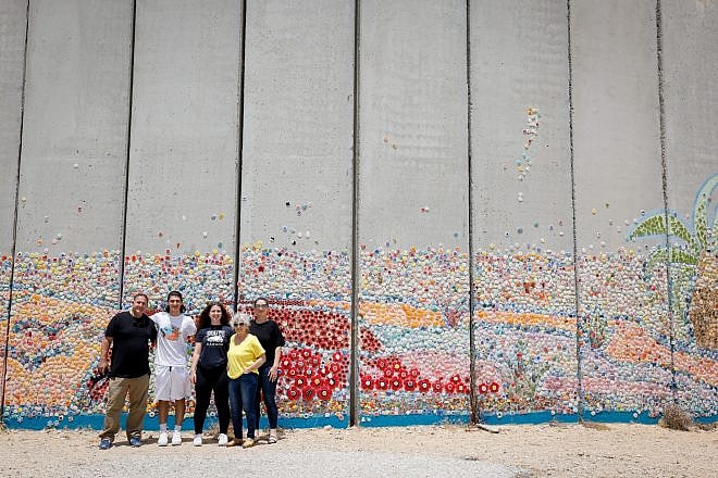 Graffiti on a concrete wall in the Israeli kibbutz of Netiv Haasara in southern Israel, May 15, 2023. Photo by Nati Shohat/Flash90.