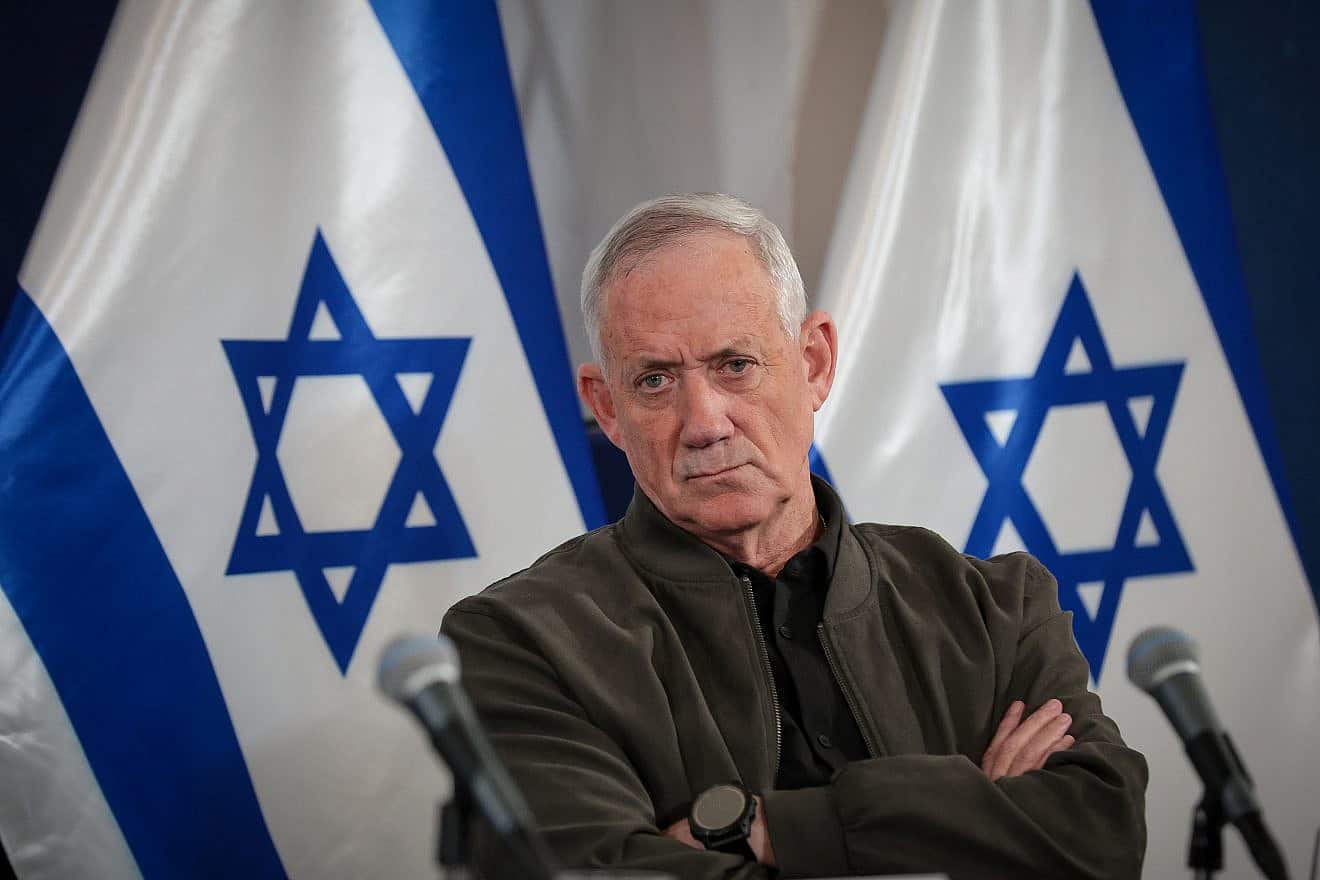 Minister-without-Portfolio Benny Gantz speaks to reporters at the Defense Ministry in Tel Aviv, Dec. 16, 2023. Photo by Noam Revkin Fenton/Flash90.