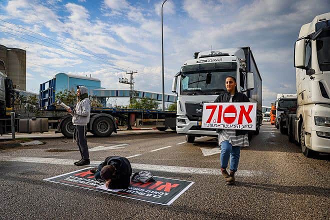 People block the entrance to Ashdod Port during a protest against aid trucks entering the Gaza Strip, Feb. 1, 2024. Photo by Chaim Goldberg/Flash90.