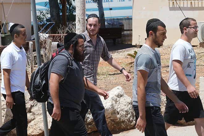 Ultra-Orthodox recruits arrive at the IDF’s Bakum Reception and Sorting Base at Tel Hashomer in Ramat Gan, Aug. 1, 2013. Credit: Flash90.