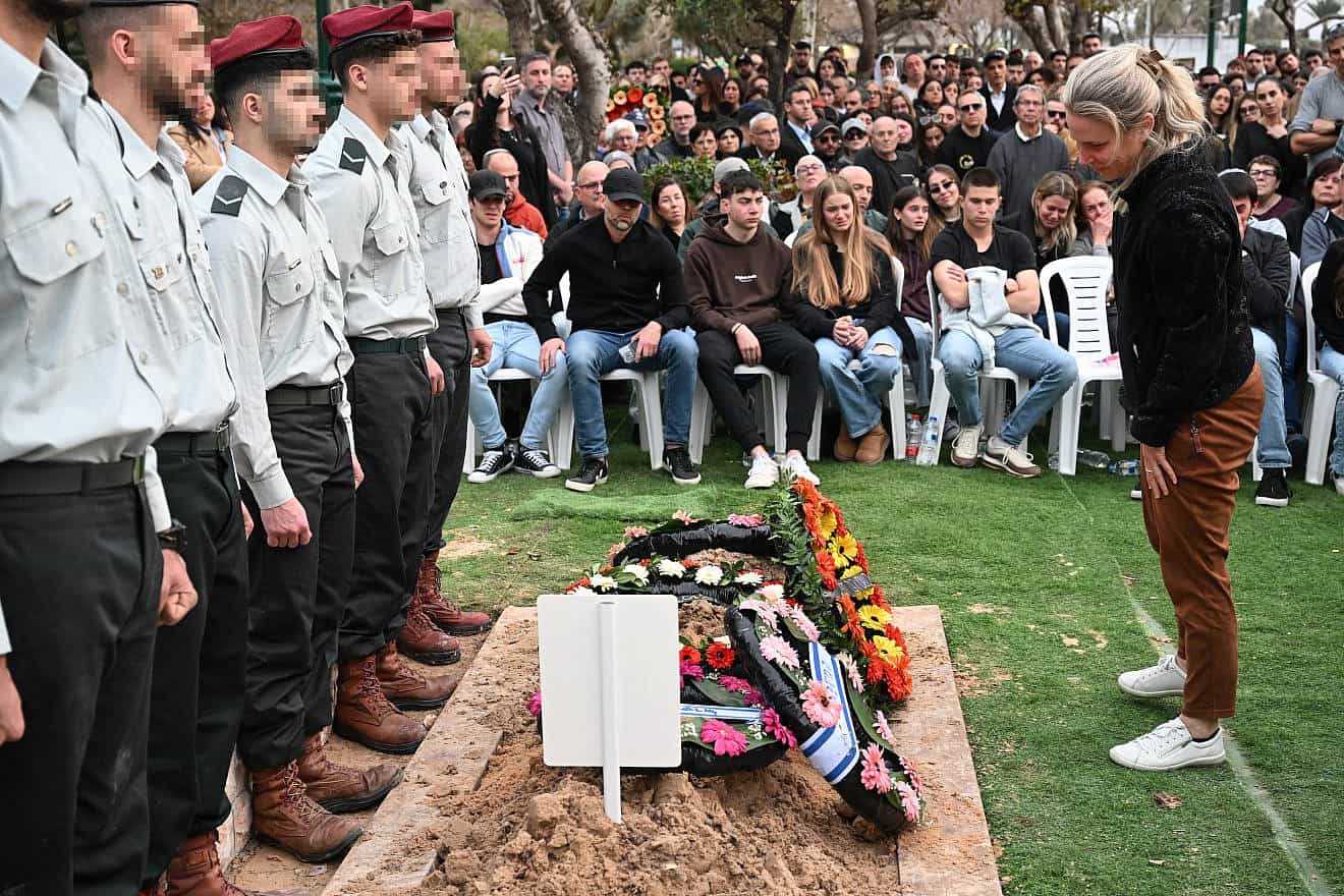 Mourners attend the funeral in Haifa of Maglan commando Sgt. Maj. Adi Eldor, 21, who was killed in action in the Gaza Strip, Feb. 7, 2024. Credit: Flash90.