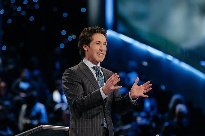 Joel Osteen preaching at Lakewood Church in Houston on Sept. 21, 2018. Credit: Justin Brackett via Wikimedia Commons.