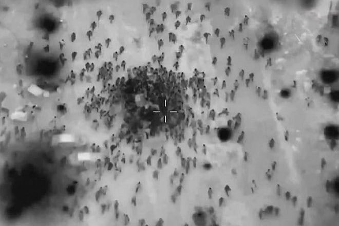 Screenshot of aerial footage provided by the IDF of Gazans rushing aid trucks on Feb. 29, 2024. Source: X.