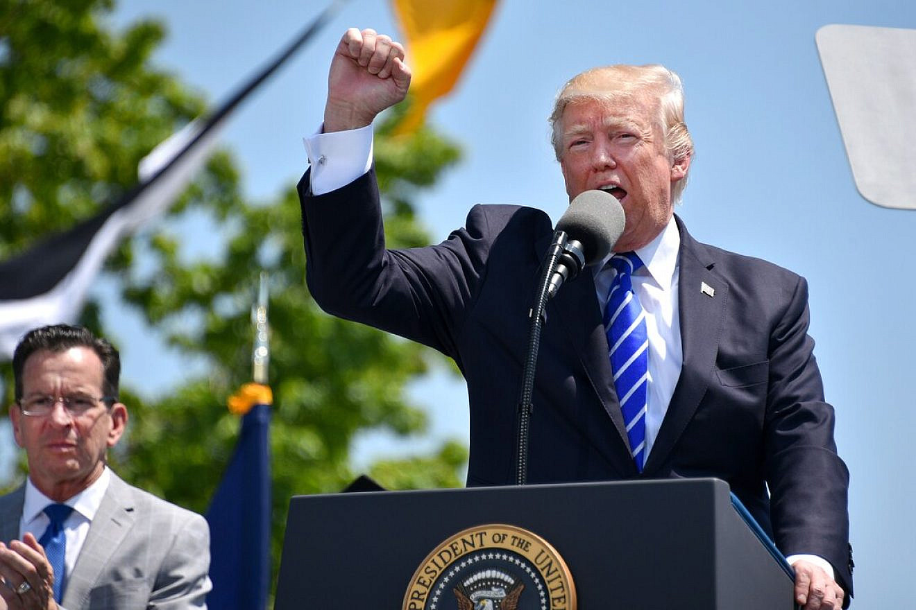 Then-President Donald Trump delivers the commencement address at the U.S. Coast Guard Academy in New London, Conn., May 17, 2017. Credit: Petty Officer 2nd Class Patrick Kelley/Coast Guard photo.