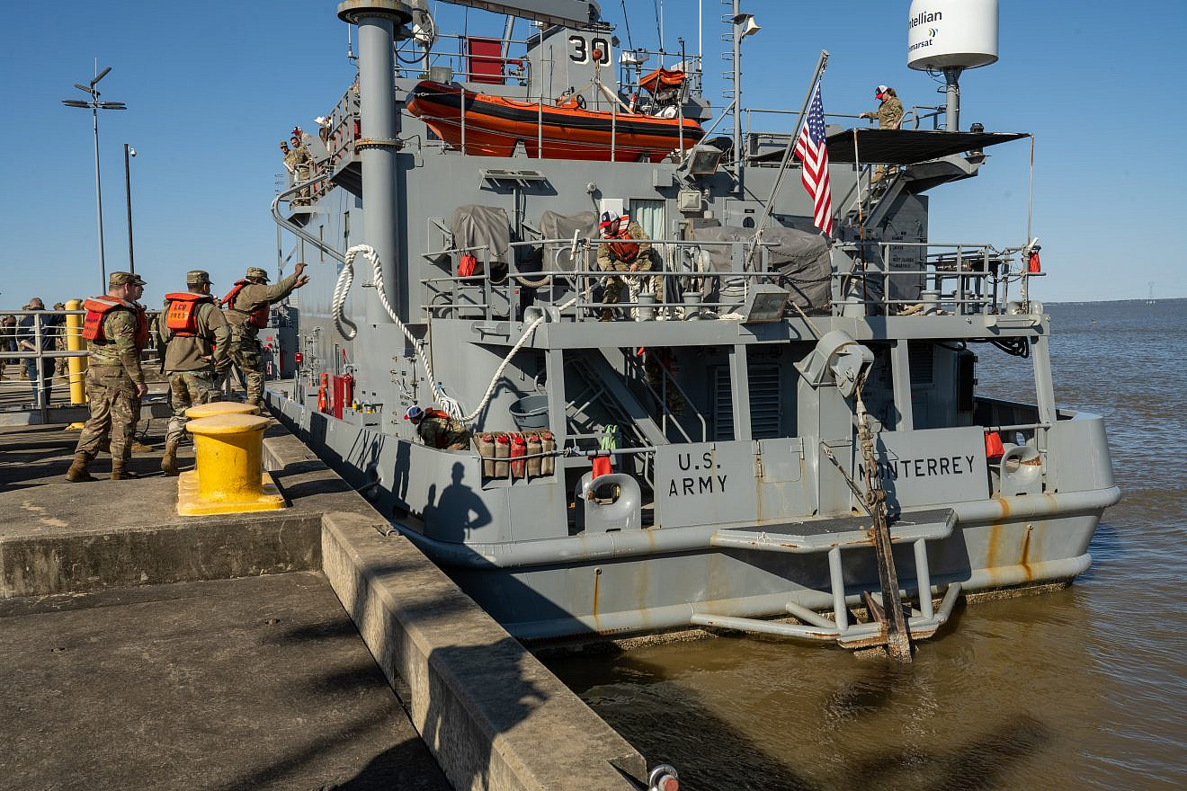 U.S. soldiers with the 7th Transportation Brigade (Expeditionary) ready the USAV SP4 James A. Loux to deploy from Joint Base Langley-Eustis, Va. on March 12, 2024. Credit: Joseph Clark/U.S. Department of Defense.