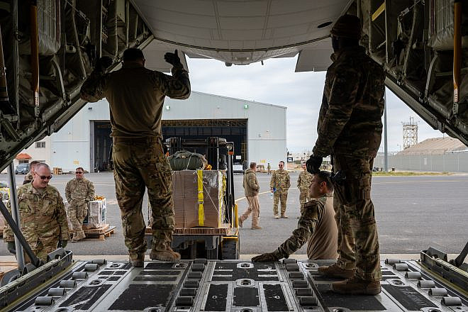 U.S. Air Force loadmasters and crew chiefs load bundles of humanitarian aid destined for an airdrop over Gaza onto a U.S. Air Forces Central HC-130J Combat King II at an undisclosed location within the U.S. Central Command area of responsibility on March 16, 2024. Credit: U.S. Air Forces Central Public Affairs.