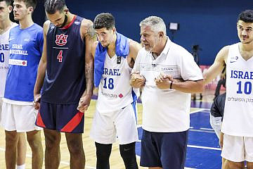 Coach Bruce Pearl with players from Auburn University and the Israel U-20 squad before their game in Israel in August 2022. Photo by Steven Leonard/Auburn Athletics.