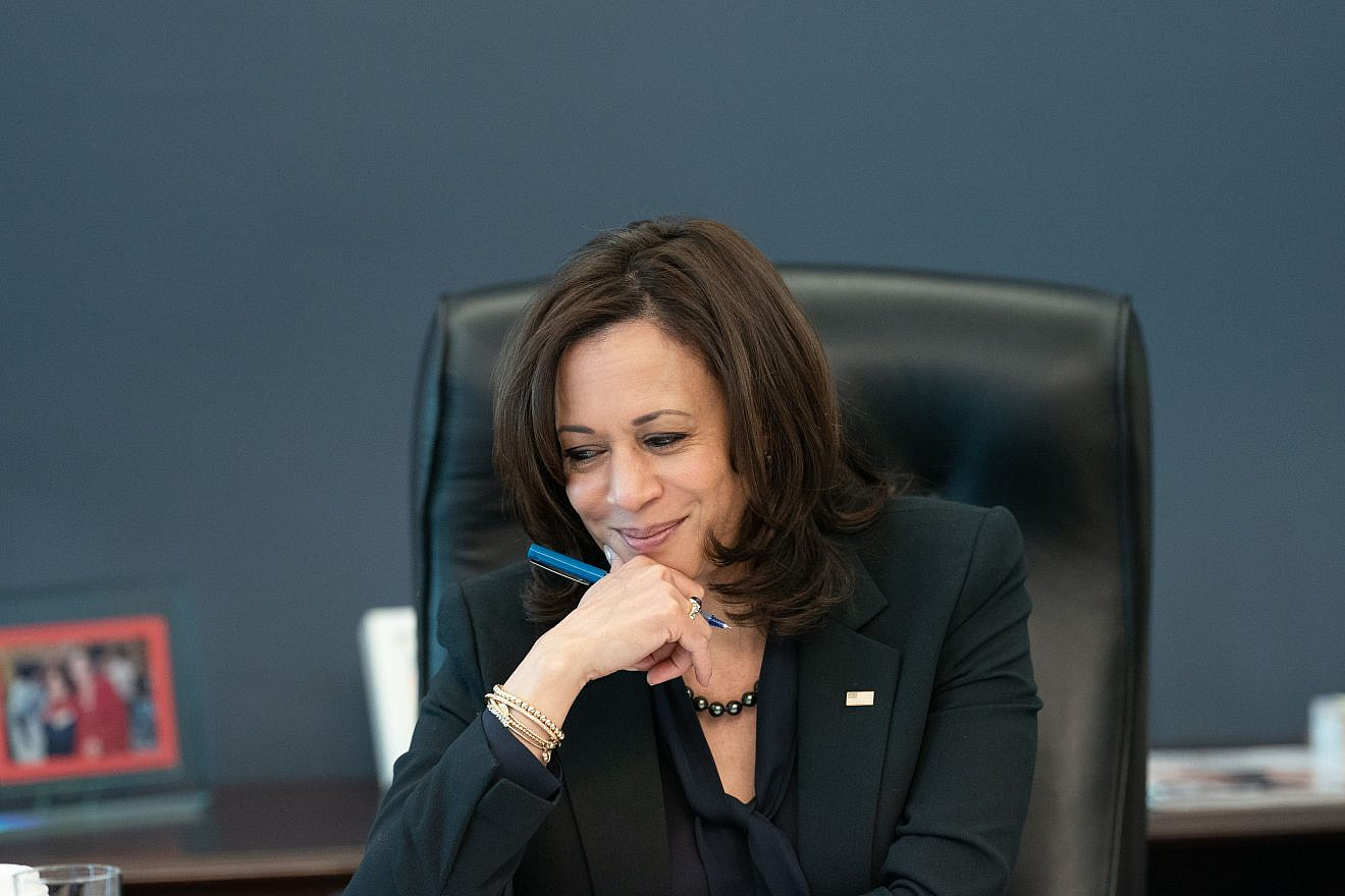 U.S. Vice President Kamala Harris talks on the phone with World Trade Organization General Okonjo-Iweala in her West Wing Office of the White House on March 11, 2021. Credit: Lawrence Jackson/White House.