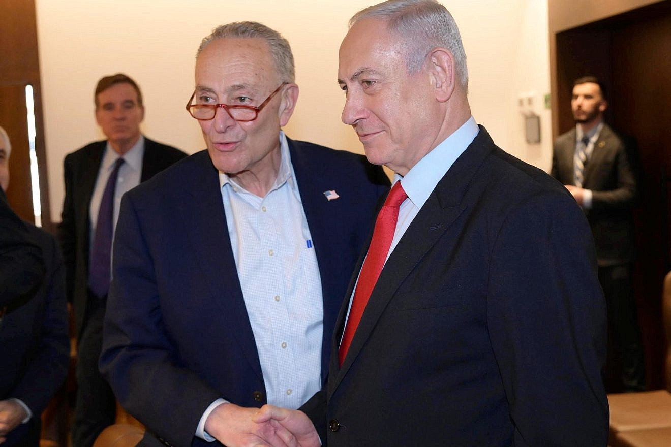Israeli Prime Minister Benjamin Netanyahu meets with Senate Majority Leader Chuck Schumer (D-N.Y.) in Israel in February 2023. Credit: Amos Ben-Gershom/GPO.