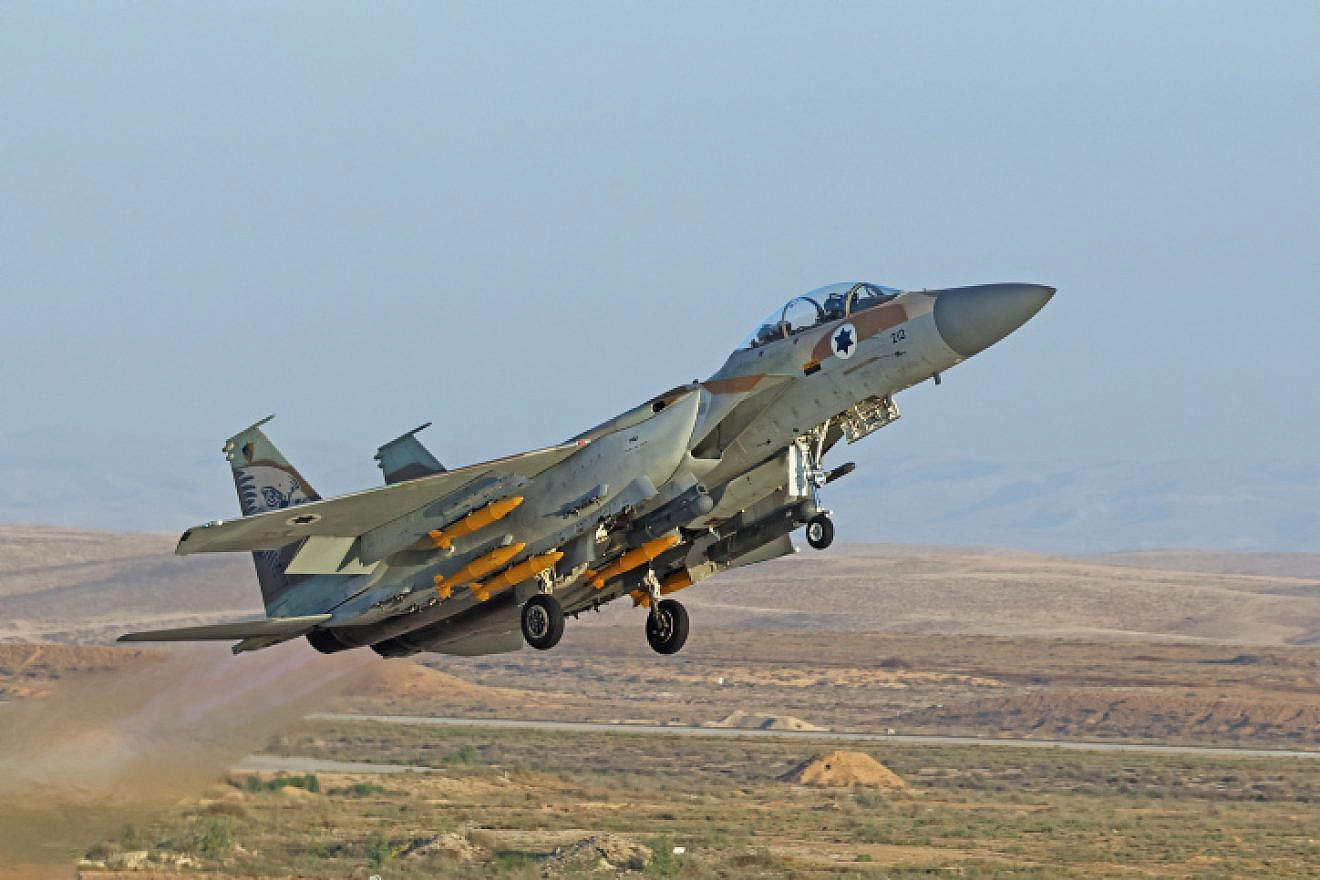 A F-15I RAAM from 69 squadron armed with practice bombs takes part in an Israeli air force air show during the graduation ceremony for soldiers who have completed the IAF Flight Course, at the Hatzerim Air Base in the Negev desert, June 29, 2023. Photo by Ofer Zidon/Flash90.