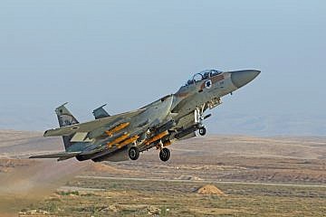 A F-15I RAAM from 69 squadron armed with practice bombs takes part in an Israeli air force air show during the graduation ceremony for soldiers who have completed the IAF Flight Course, at the Hatzerim Air Base in the Negev desert, June 29, 2023. Photo by Ofer Zidon/Flash90.