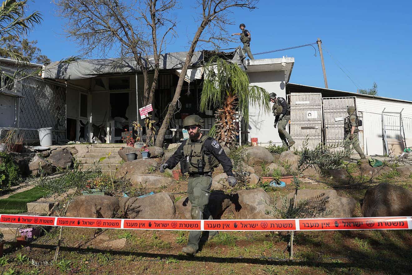 Israeli security forces inspect damage to a home after a Hezbollah rocket fired from Lebanon hit the northern city of Kiryat Shmona, March 5, 2024. Photo by Ayal Margolin/Flash90.