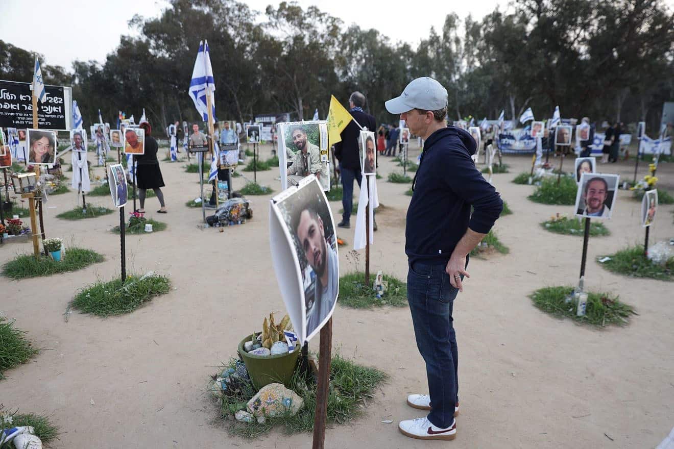 ELNET trip participants visit the site of the Nova music festival in southern Israel, where on Oct. 7, Hamas terrorists infiltrated the Gaza border and killed hundreds of young people, February 2024. Credit: Courtesy.