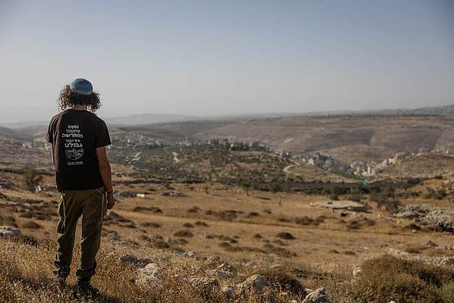 A resident of the Ramat Migron outpost in the Binyamin region of Samaria, Sept. 8, 2023. Photo by Chaim Goldberg/Flash90.